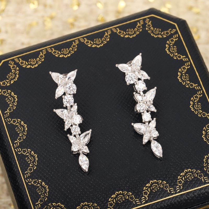 T*f*ny earrings